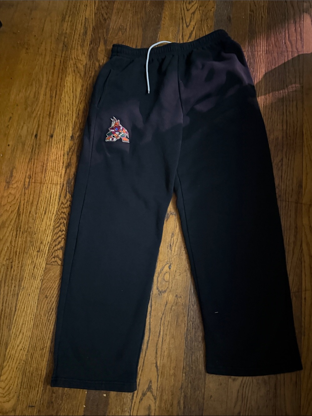 NHL Black Men's Fleece Sweatpants with Arizona's  Coyotes